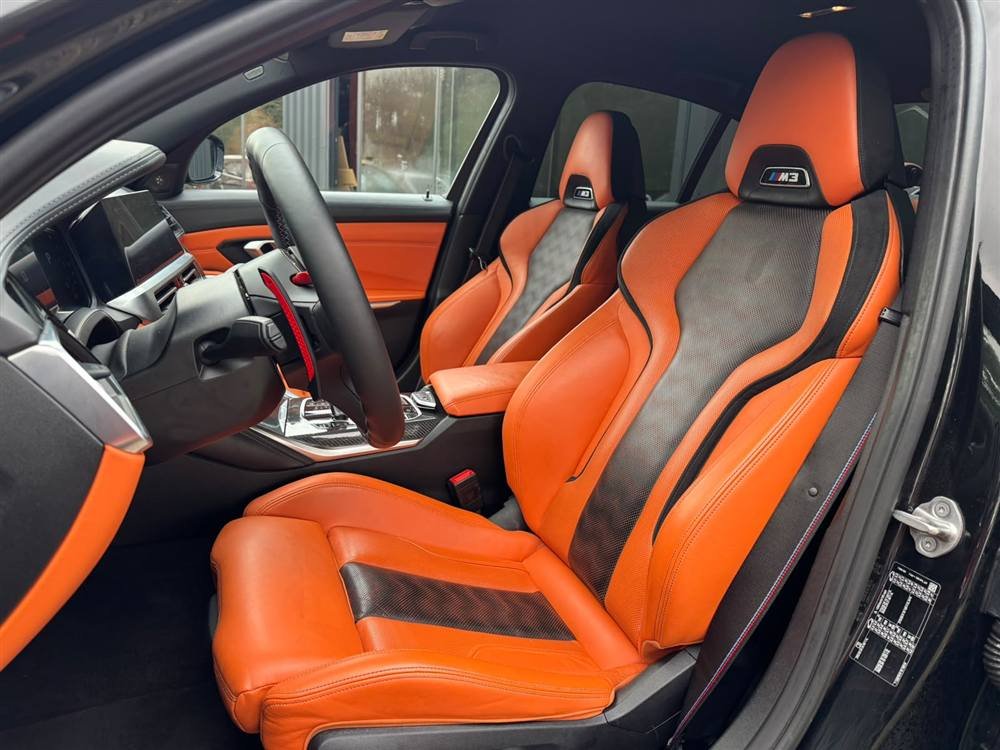 Intérieur BMW M3 cuir orange après nettoyage complet et soin des cuirs